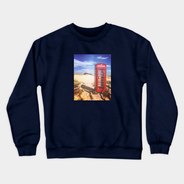 Red phone box on the beach Crewneck Sweatshirt by Lionik09